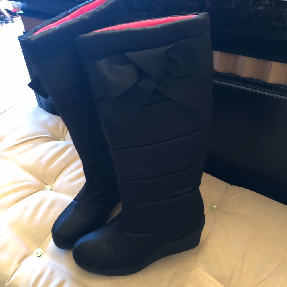 Black Kate Spade quilted boots